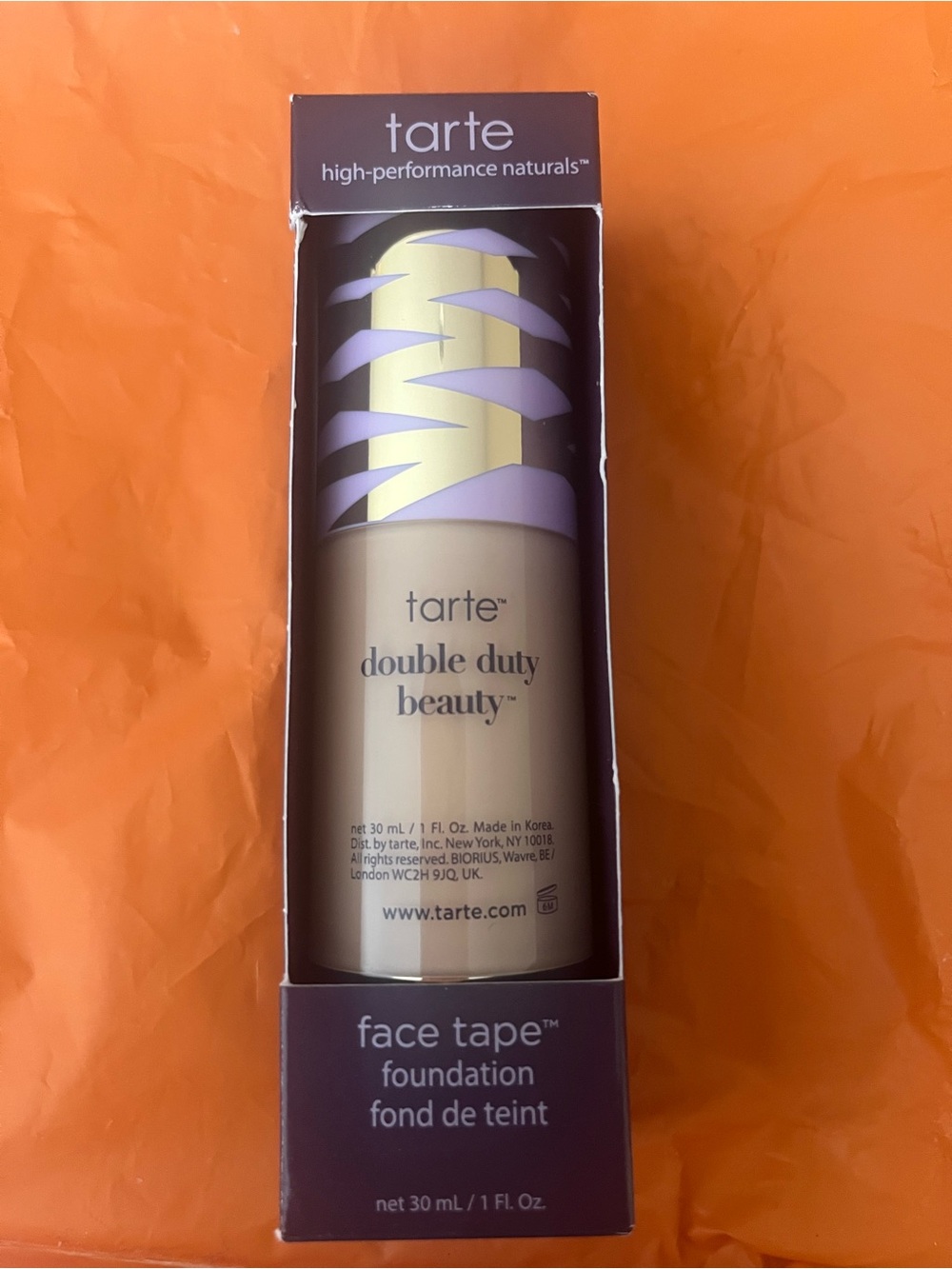 tarte Double Duty Beauty Face Tape Foundation — purple cap with cream bottle